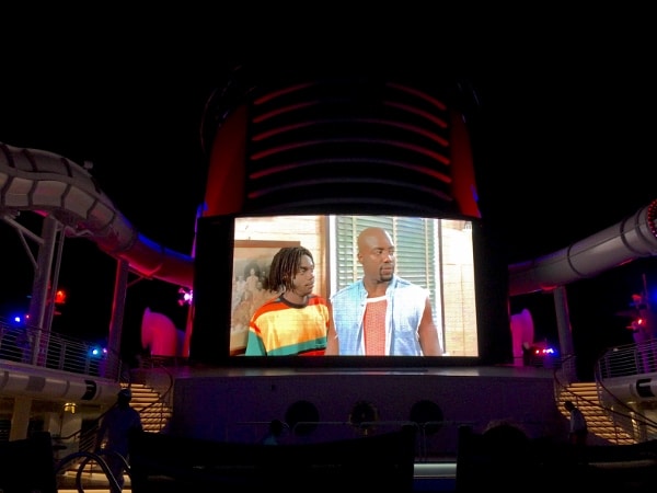 watching Cool Runnings on the Funnelvision screen on the Disney Fantasy at night