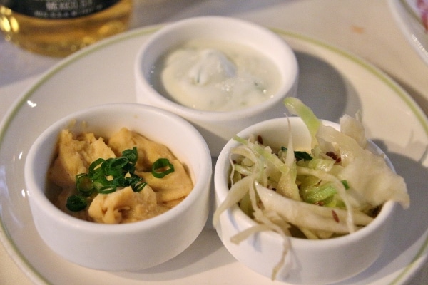 small bowls filled with various sauces and toppings