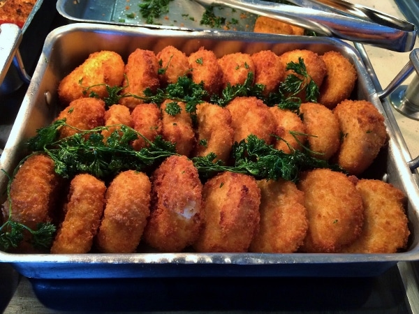 fish cakes on a lunch buffet line