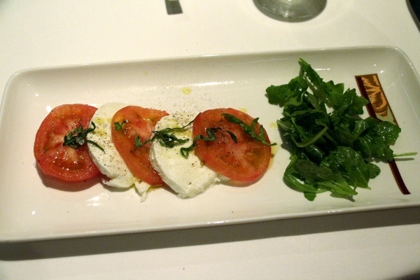 a plate of caprese salad