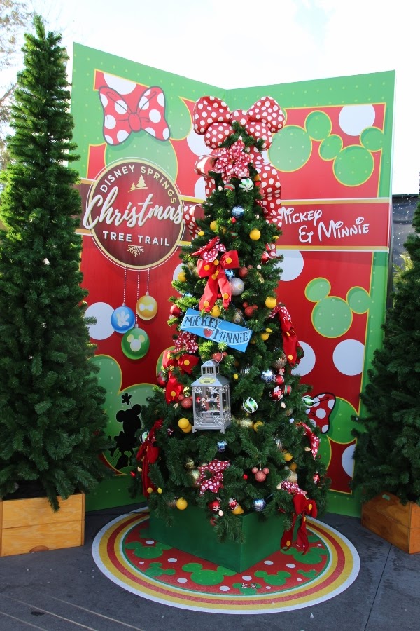a Christmas tree decorated with a Mickey and Minnie Mouse theme