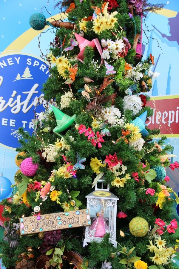 a Christmas tree decorated with a Sleeping Beauty theme