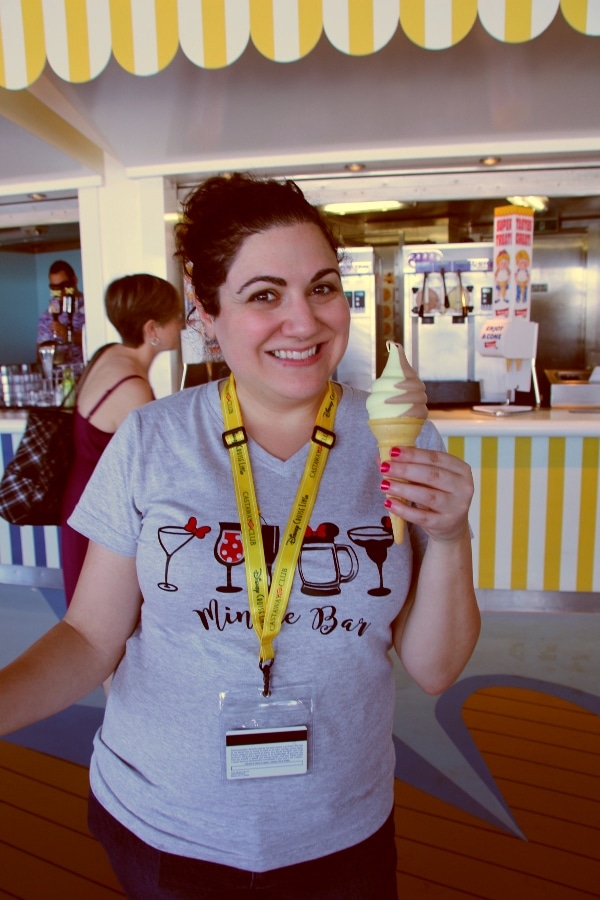 a woman holding an ice cream cone