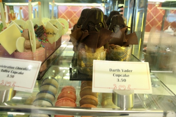 a Darth Vader cupcake on display