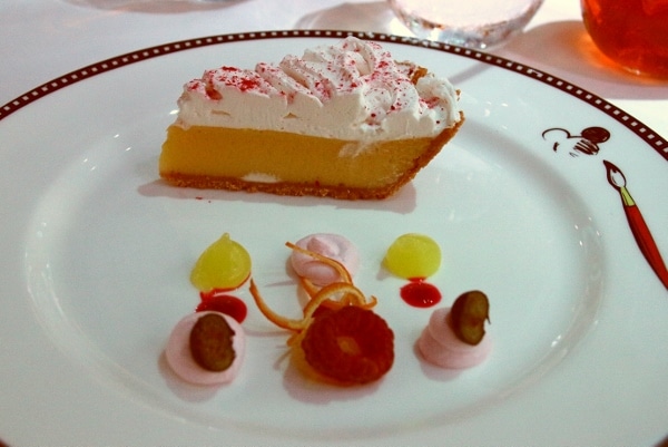 a slice of pie with colorful garnishes