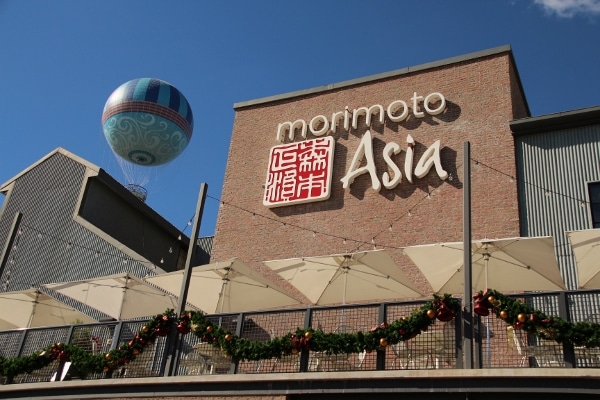 A sign on a building that says Morimoto Asia