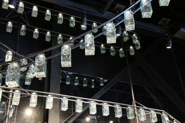 hanging bottles on display inside a restaurant