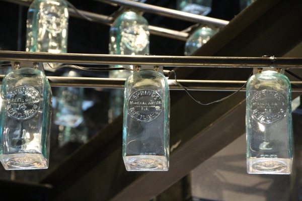 closeup of bottles on display in a restaurant