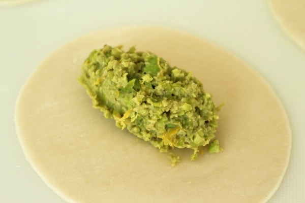 Edamame filling on a dumpling wrapper