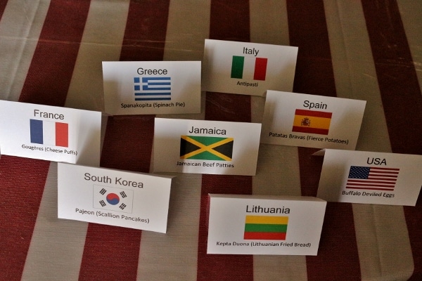 folded cards labeled with country and food names with images of flags
