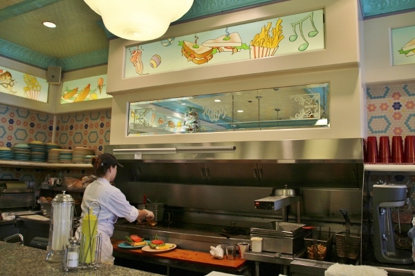 A person cooking in a professional kitchen