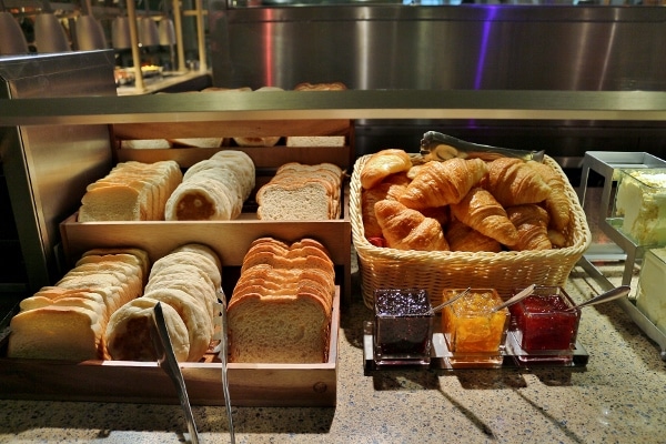 a variety of breads on a buffet