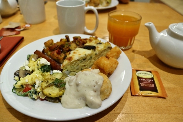 a plate of breakfast foods from a buffet