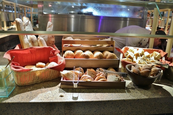 a variety of breads on a buffet