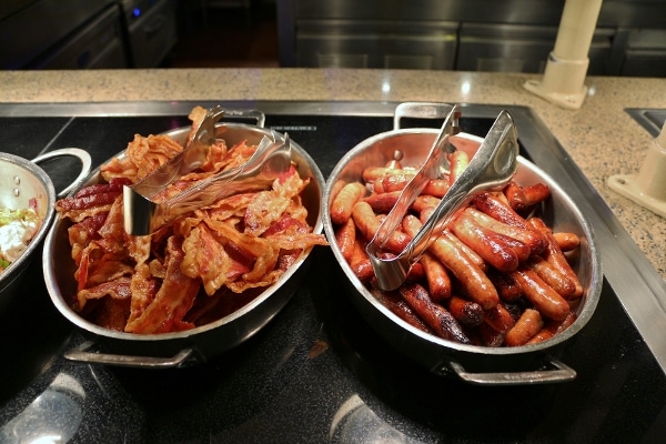 bacon and sausage on a breakfast buffet
