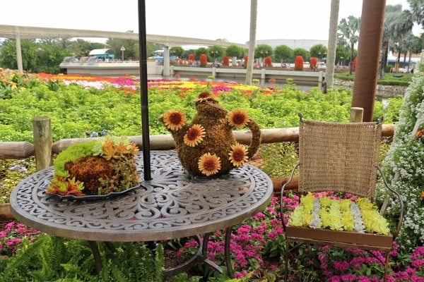 closeup of a teapot made of flowers