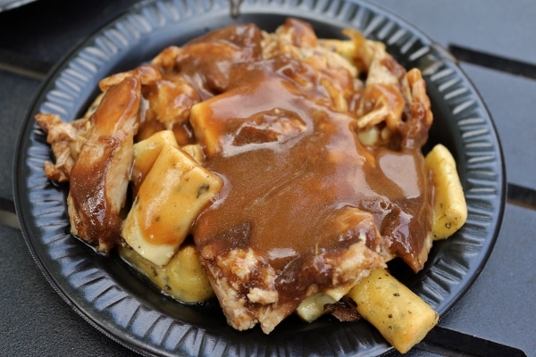 a plate of Parisian gnocchi and braised duck with sauce