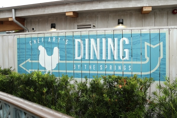 a sign that says Chef Art\'s Dining by the Springs