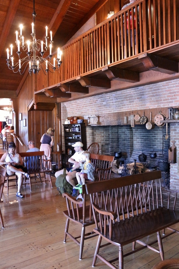 the waiting area inside Liberty Tree Tavern at Disney\'s Magic Kingdom