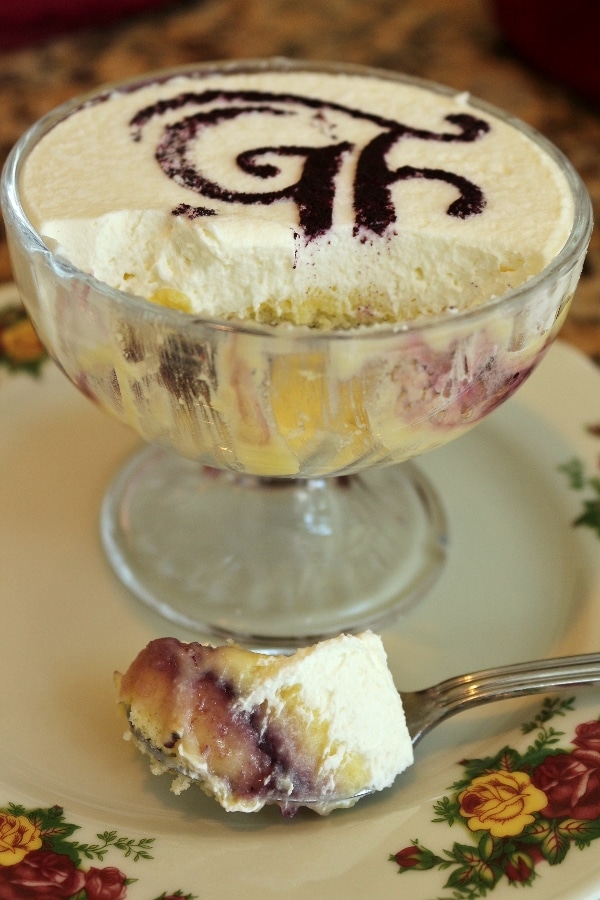 a half-eaten dish of trifle