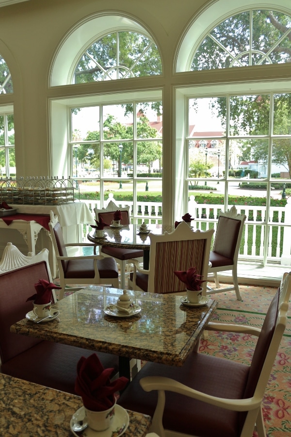 A dining room table in front of a window