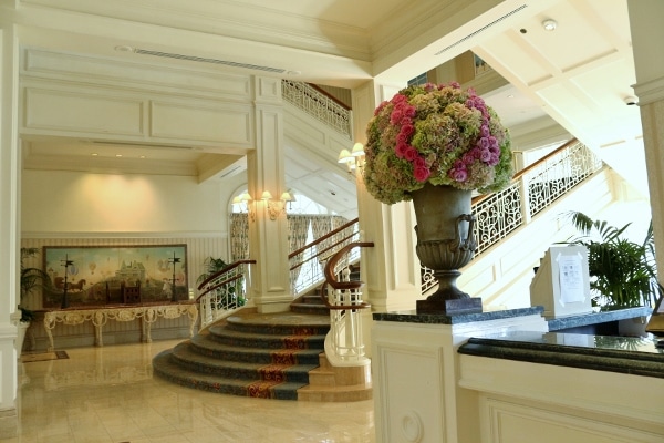 A vase of flowers in a resort lobby