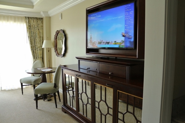 A flat screen tv in a hotel room