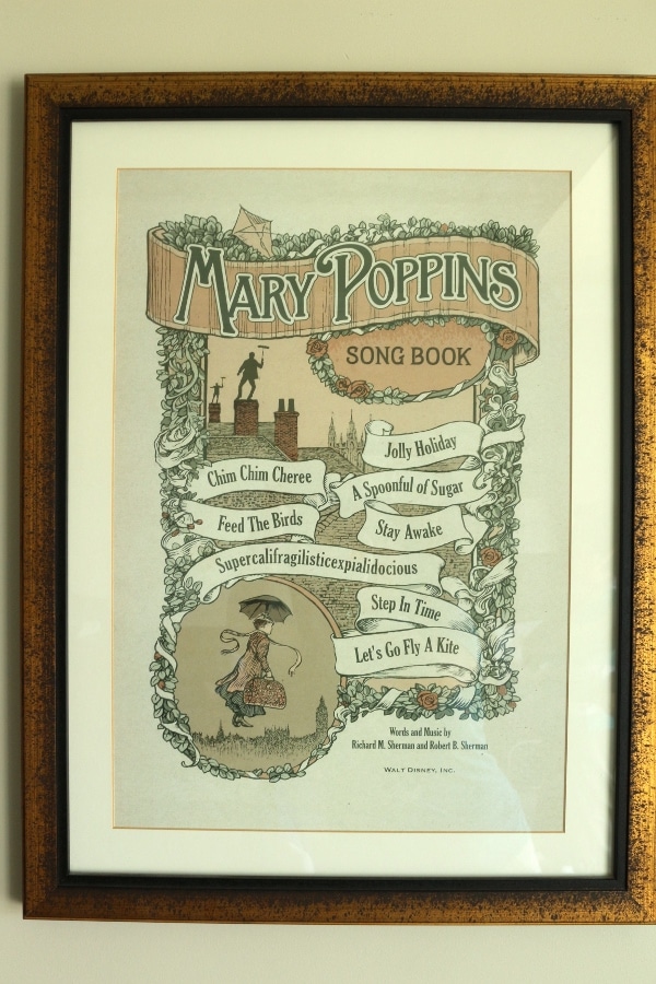 a framed Mary Poppins illustration