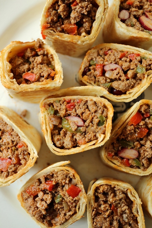 A platter of Mexican hot pockets: tortillas with beef filling