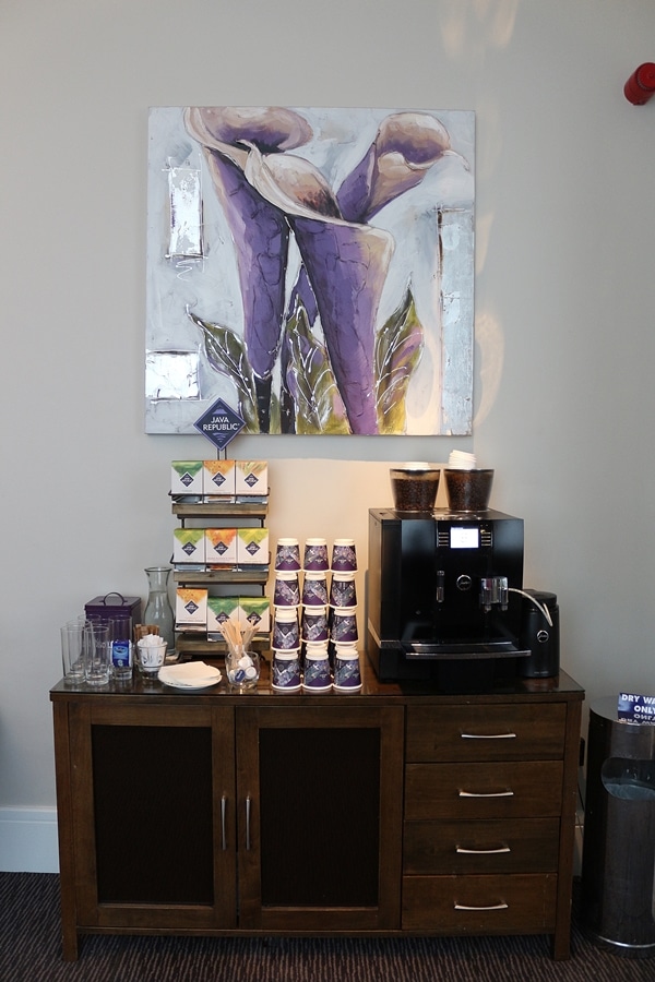 a coffee maker in a hotel lobby