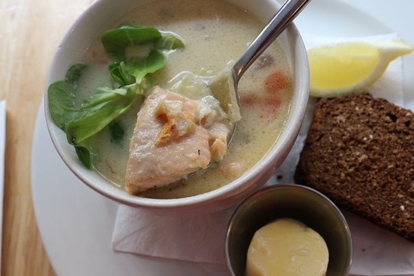 a closeup of a bowl of salmon chowder