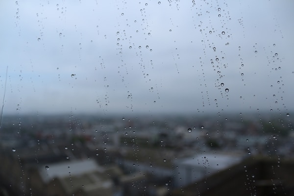 view through a rain covered window