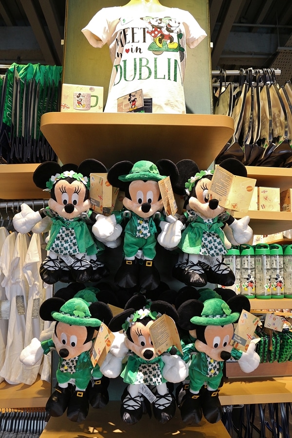 closeup of Irish themed Mickey and Minnie Mouse dolls