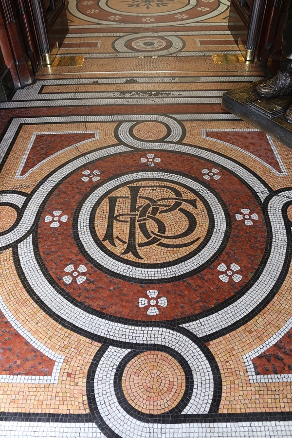 A close up of a mosaic tile floor