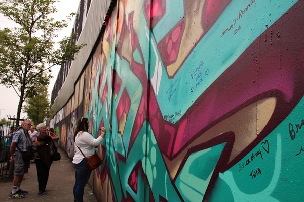 colorful graffiti on the Peace Wall in Belfast