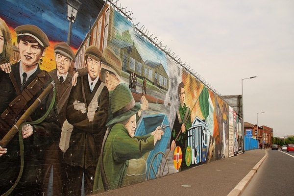 a colorful painted mural on a wall in Belfast