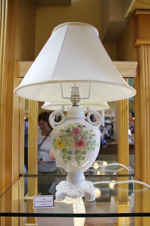 a lamp with flowers on it