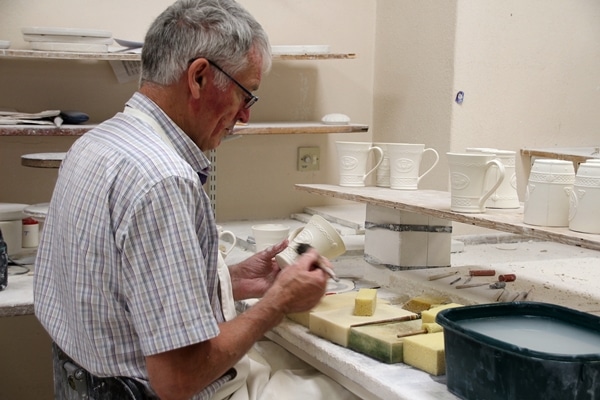 A man making pottery