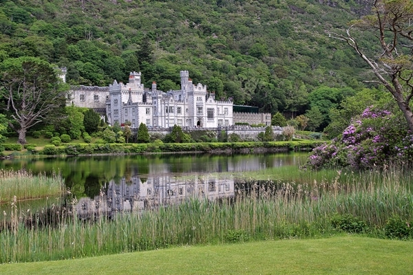 A castle overlooking a pond