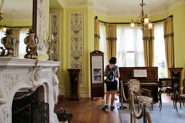 A living room with an ornate fireplace