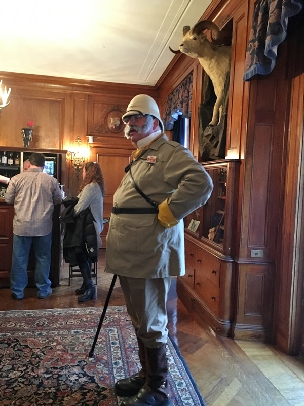 A man dressed as Colonel Mustard from Clue