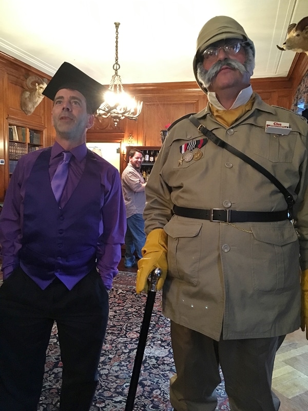 men dressed as Professor Plum and Colonel Mustard from Clue