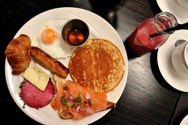 A plate of breakfast foods from a buffet