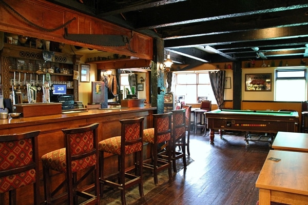 a seating area by a bar