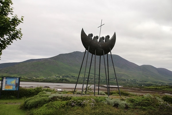 a monument of people in a boat