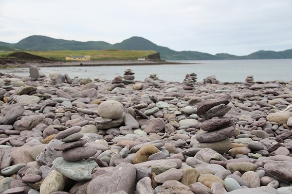 A rocky shore next to a body of water