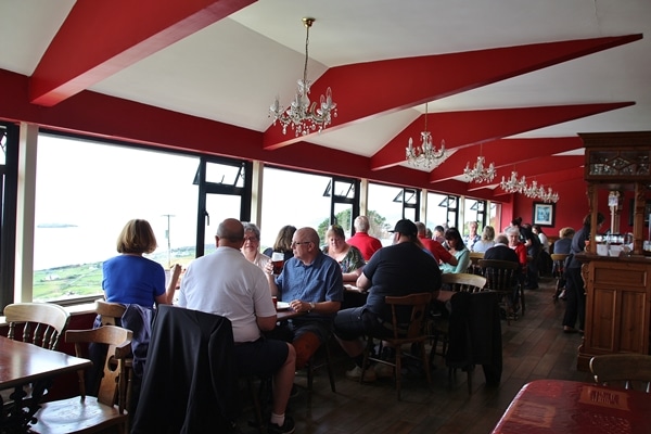 A group of people sitting in a restaurant