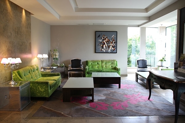 a sitting area in a hotel lobby