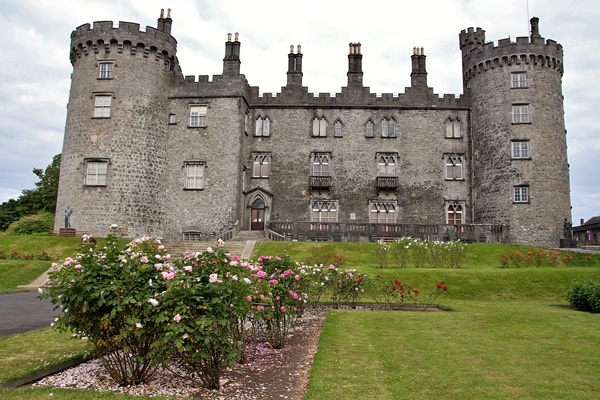 Exterior of Kilkenny Castle with gardens in front