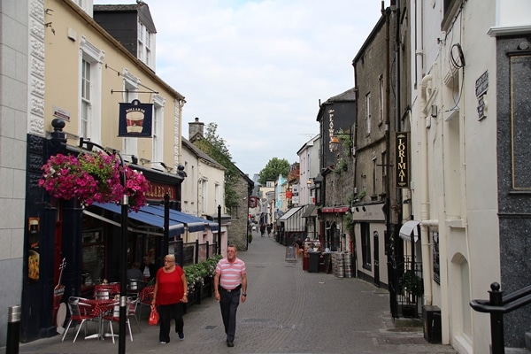 A person walking down a city street